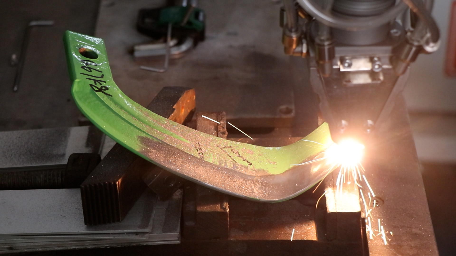 Laser clad rotary plow blades