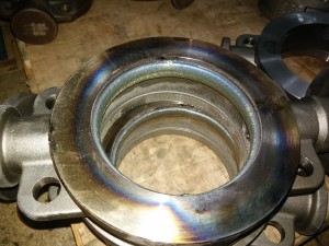 PTA hardfacing for erosion protection inside industrial valve cavity